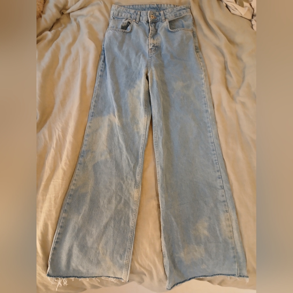 Ragged Light Blue Denim Jeans